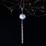 Ivory and water droplets pendant on long chain