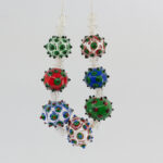 Transparent and colorful hollow lampwork bead necklase with bumps.