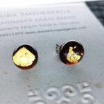 Dark amber stud earrings with 24 carat gold