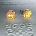 Creme color stud earrings with 24carat gold