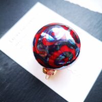 Transparent orange and silver glass Christmas ornament - Image 3