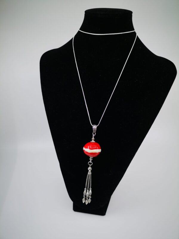 Big hollow bead pendant in colours of the Latvian flag with metal tassel on a chain